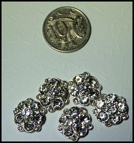 beautiful bling, flat back amazing for a vintage page or flower,